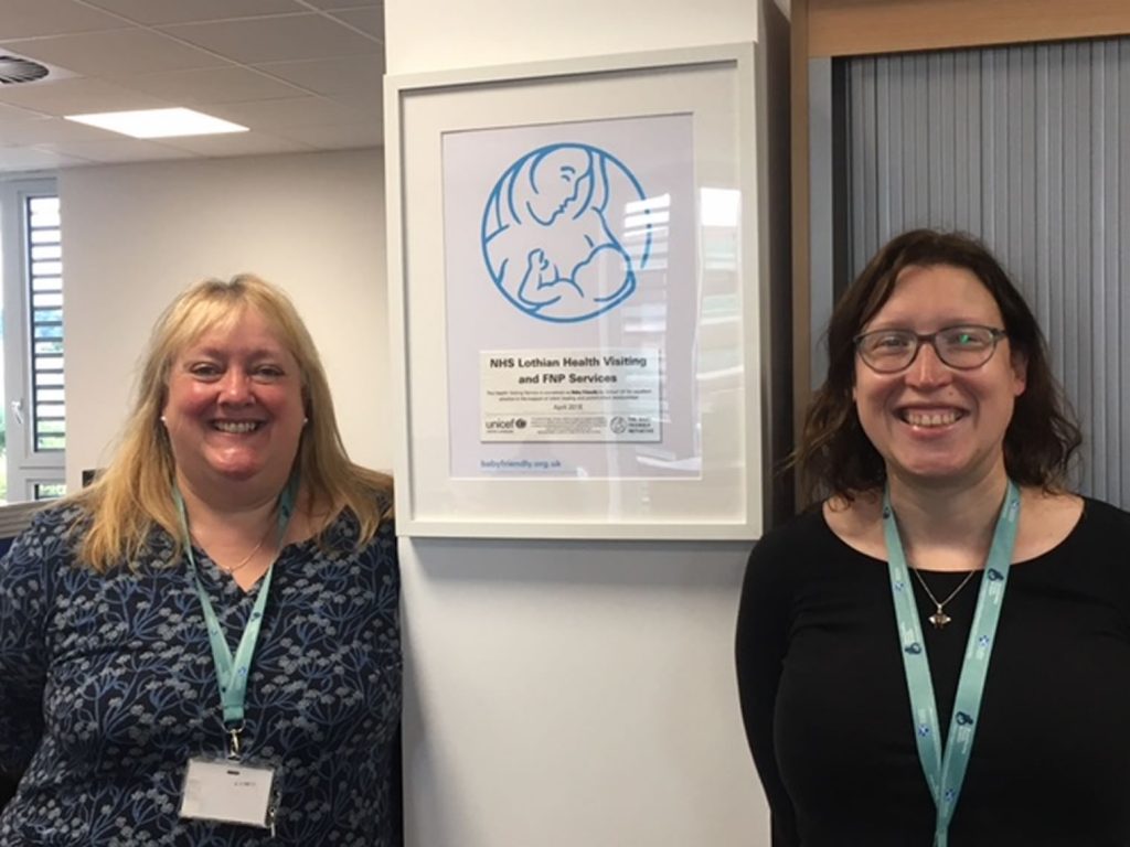 The Infant Feeding team with their framed Accreditation