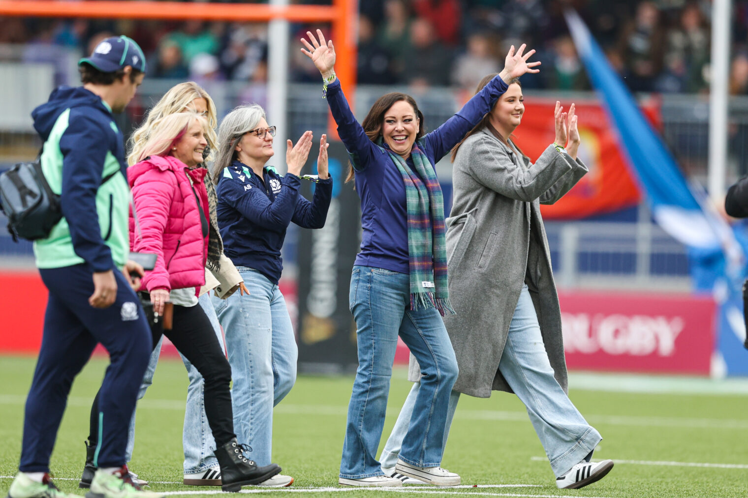 NHS Lothian nurses deliver the match ball at Hive Stadium